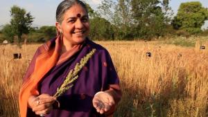 Vandana Shiva has founded non-profit organizations, community-based movements, and an Earth Institute dedicated to promoting local, sustainable agriculture. Here she is seen promoting  seed saving as an act of self-sufficiency and defiance against the corporate takeover of food production. Image credit: the Canadian Daily.